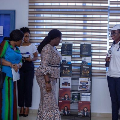 The Vice Chancellor of the University of Ghana, Prof. Nana Aba Appiah Amfo admiring the unique design of the magazine stand.